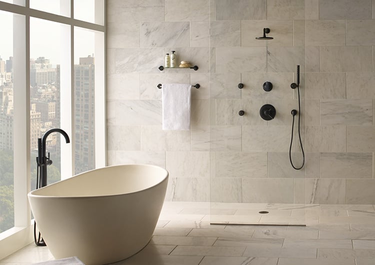 Modern shower with water running, indicating fixture service